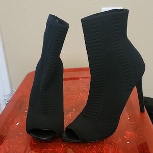Sleek Black Textured Heeled Boots